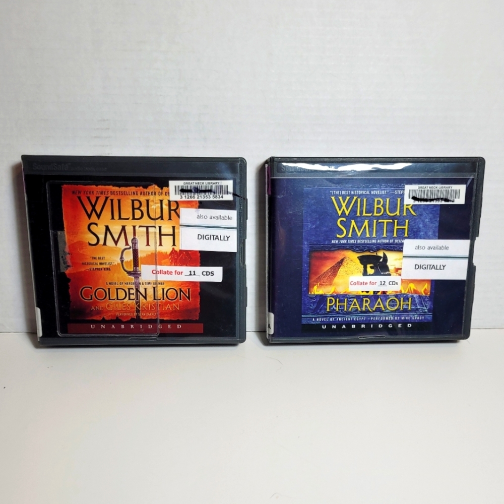Wilbur Smith Lot of 2 Audiobooks on CDs Fiction Golden Lion and Pharaoh Ex-Libra